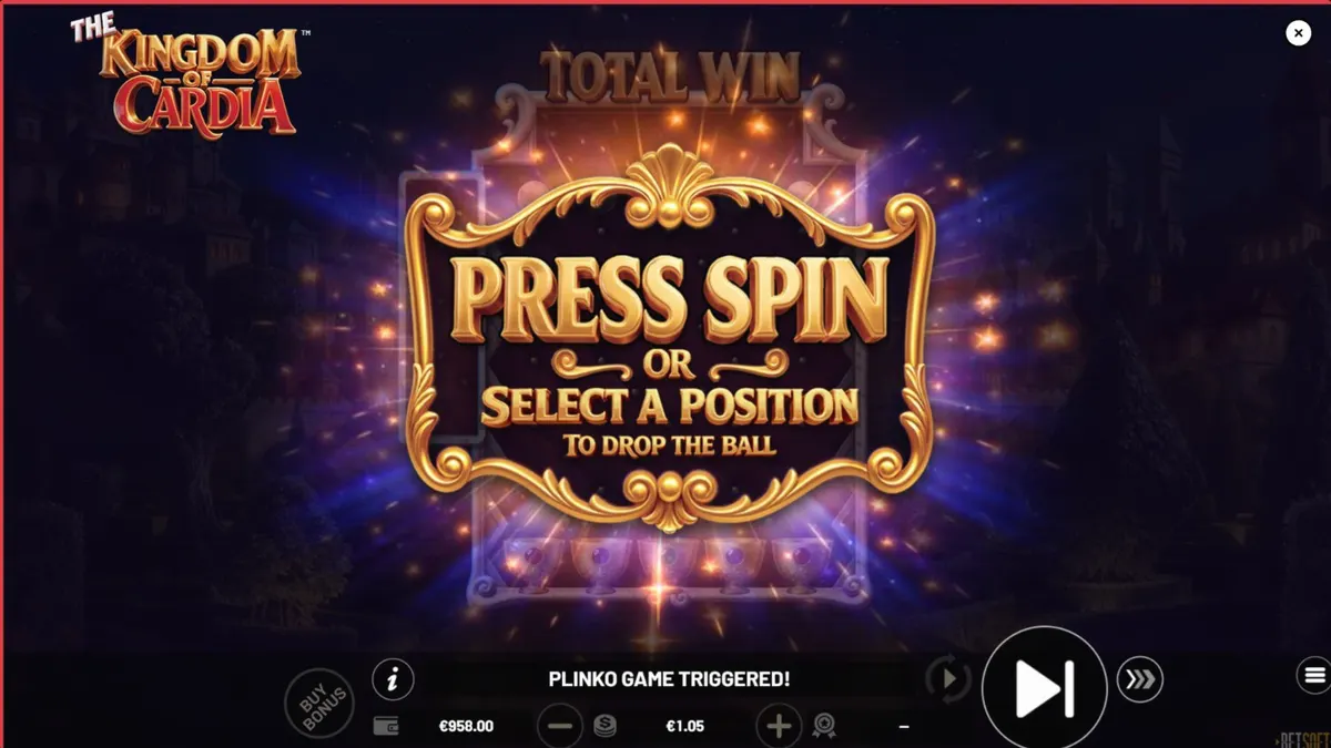 The Kingdom of Cardia slot game visual interface featuring royal card symbols and a magical garden backdrop.